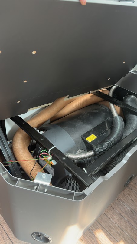 View into area under bench seat